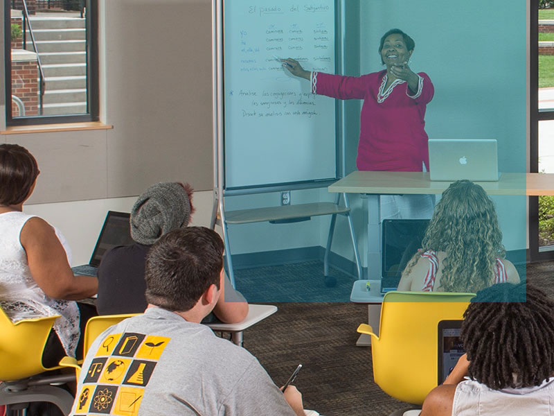 Professor teaching a small class of students